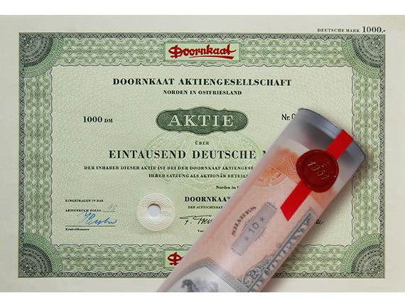Aktie 1960 DOORNKAAT AG in edler Geschenkrolle