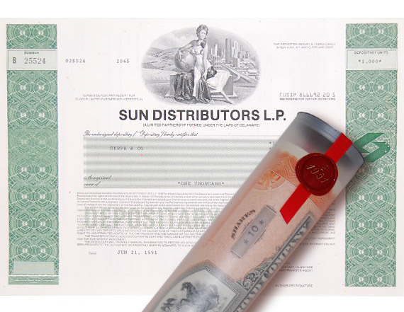 Aktie 1991 SUN DISTRIBUTORS in edler Geschenkrolle